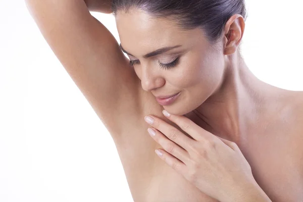 Woman's smooth underarm with laser technology