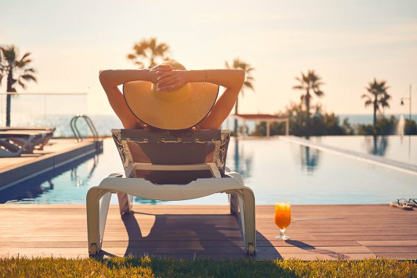 woman swimming pool summer laser hair removal birmingham
